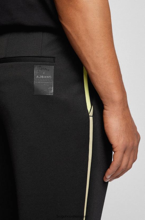 Hugo Boss x ajbxng szűkülő szabású nadrág bisztreccs trikóból 80P64007 fekete