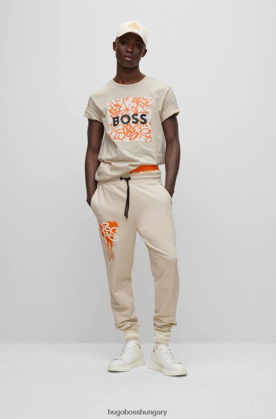 Hugo Boss hugo pamutdzsörzé póló logóval és graffitivel, világos bézs színű 80P61691 világos bézs