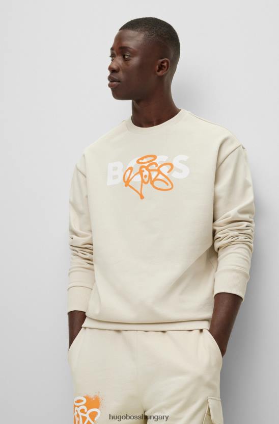 Hugo Boss hugo laza szabású pamut pulóver világos bézs graffiti logóval 80P61532 világos bézs
