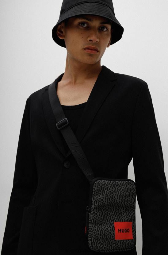 Hugo Boss mintás logóval nyomtatott riportertáska piros hugo márkás címkével 80P65428 mintás